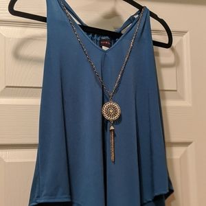 Blue green sleeveless shirt